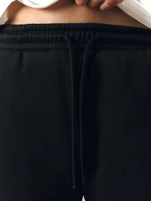 PLAYBOY X SUMWON Wide Leg Track Pants With Burgundy Side Panel Contrast Piping Embroidered Script Logo Drawstring Waist Full Length - Black - View 6