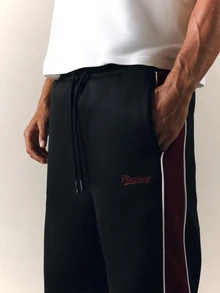PLAYBOY X SUMWON Wide Leg Track Pants With Burgundy Side Panel Contrast Piping Embroidered Script Logo Drawstring Waist Full Length - Black - View 5
