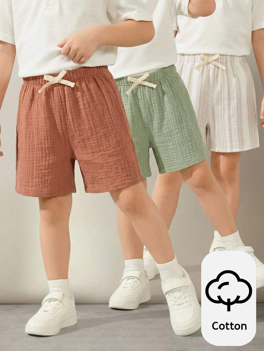 SHEIN 3件組小男孩休閒運動短褲，復古條紋與純色白色夏季款，返校多件裝日常出行服飾