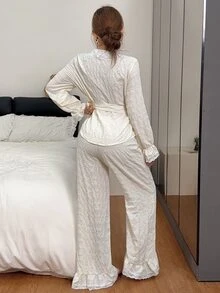 Napfluff طقم بيجامة نسائي بأسلوب ملكي بلون موحد وياقة على شكل حرف V مع حواف متباينة وأزرار أمامية وأكمام طويلة وبنطال - لون مشمشي - مشاهدة 7