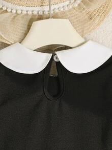 SHEIN 女童百褶蝴蝶結滿版印花洋裝，休閒可愛學院風，寬鬆舒適，適合秋季返校、戶外運動與日常穿搭 - 黑色 - 查看 7