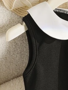 SHEIN 女童百褶蝴蝶結滿版印花洋裝，休閒可愛學院風，寬鬆舒適，適合秋季返校、戶外運動與日常穿搭 - 黑色 - 查看 6
