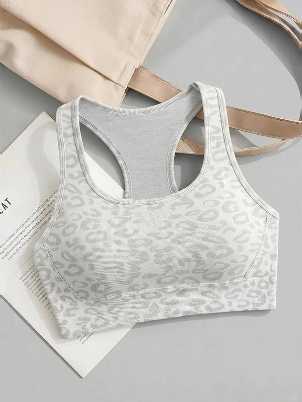 SHEIN Cheerettes Áo ngực thể thao nữ họa tiết da báo màu trắng, không đường may, mềm co giãn, đan kim, có miếng đệm tháo rời, lưng racerback, cho yoga và tập gym