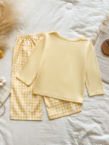 SHEIN Vintaside Kids 女嬰兩件套，包含一件黃色圓領長袖T恤上衣和一條鬆腰直筒長褲。風格清新甜美、鄉村休閒可愛。由針織與梭織布料製成。左胸飾有立體花卉圖案。長褲印有黃色與白色格紋雛菊圖案。版型寬鬆舒適，厚度適中。適合休閒、上學、公園散步等場合。 - 黃色 - 查看 2