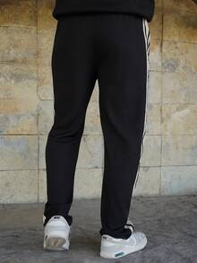 LEOGASHI LEOGASHI Men's Casual Outdoor Sports Straight Leg Pants With Contrast Stripes, Suitable For Spring And Autumn - Black - View 2