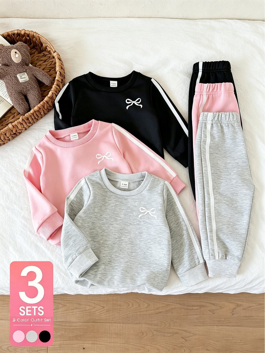 SHEIN Playful Pals 女嬰秋冬可愛蝴蝶結保暖內裡加厚寬鬆圓領長袖衛衣搭配側條紋運動褲 6 件套，休閒舒適多件套裝，適合日常穿著、戶外運動、聚會等多種場合