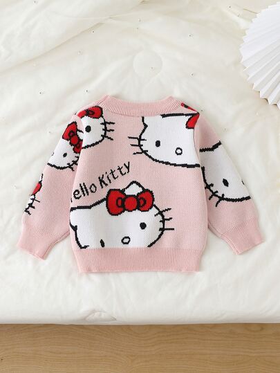 HELLO KITTY AND FRIENDS | SHEIN GraphicGems סוודר סריג פולאובר לתינוקות בנות עם צוואון עגול, רקמת מגבת תלת-ממדית, הדפס ג'קארד מלא, רך ונוח, פשוט חמוד אלגנטי ומסוגנן, שרוול ארוך, צבע אדום, מתאים לנסיעות, יציאה, מסיבה, משחק בחוץ ופיקניק, לסתיו וחורף