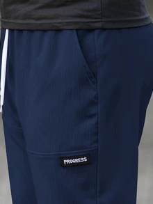 Manfinity Homme Quần dài nam màu xanh navy, cạp chun dây rút, túi hai bên, dáng rộng, size lớn, phong cách thường ngày năng động cho mùa thu và du lịch - Màu xanh hải quân - Xem 4