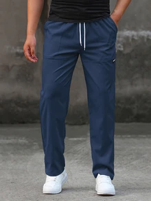 Manfinity Homme Quần dài nam màu xanh navy, cạp chun dây rút, túi hai bên, dáng rộng, size lớn, phong cách thường ngày năng động cho mùa thu và du lịch - Màu xanh hải quân - Xem 3