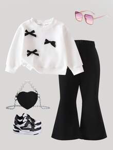SHEIN Bộ đồ len dệt kim cổ tròn tay dài có nơ trang trí dễ thương cho bé gái và quần len ống loe lưng chun, giản dị và đáng yêu, mùa thu/đông - Đen và trắng - Xem 6