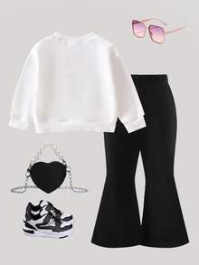 SHEIN Bộ đồ len dệt kim cổ tròn tay dài có nơ trang trí dễ thương cho bé gái và quần len ống loe lưng chun, giản dị và đáng yêu, mùa thu/đông - Đen và trắng - Xem 2