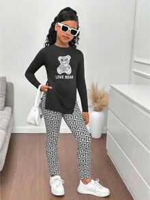 SHEIN 青少年女孩休閒針織熊圖案長袖短版上衣與幾何圖案內搭褲套裝，黑白 2 件套褲裝套裝，女孩 2 件套套裝，女孩 2 件套，女孩黑白套裝，青少年女孩套裝，女孩內搭褲套裝，女孩幾何圖案套裝，青少年女孩黑白內搭褲，青少年女孩圖案內搭褲，黑白青少年內搭褲，青少年女孩套裝，青少年女孩黑白服裝套裝，黑白內搭褲，女孩長袖上衣與內搭褲套裝，秋冬 - 黑與白 - 查看 4