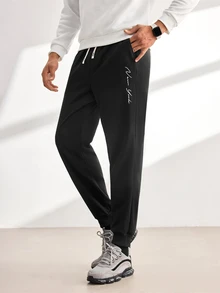 Driftmere New Autumn Men's Sweatpants, Featuring A Letter Print Design, Casual Style, Comfortable Elastic Drawstring Waist, Perfect For Travel And Vacations. - Black - View 1