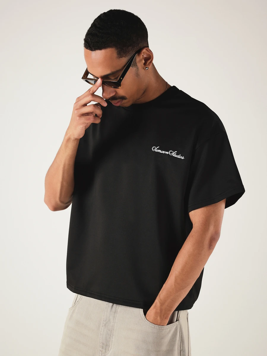 SUMWON Boxy Fit Blvd Script Logo Oversized Crew Neck Short Sleeve T-Shirt With Back Graphic Print - Black - View 1