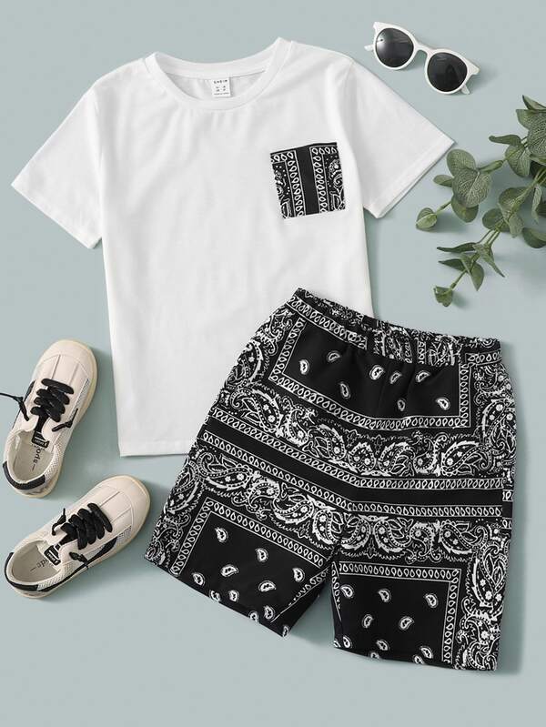SHEIN ティーンボーイ カジュアル ルーズフィット ホワイトクルーネックTシャツ&ブラックカシューフラワーショーツセット、学校、デイリーカジュアル、スポーツ、春夏シーズンに適しています