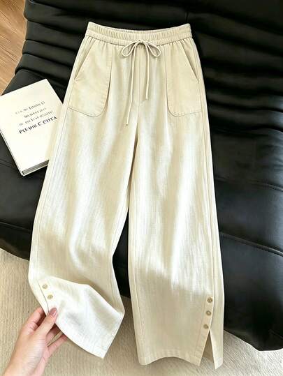 SHEIN Pantalones casuales de pierna ancha con textura color albaricoque para mujer, cintura elástica con cordón, cintura alta, bolsillos grandes, abertura lateral con botón en el bajo, pierna recta con caída y largo hasta el suelo