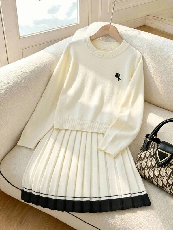 SHEIN Genkimix Kids Tween Girl Winter Knit 2 Pieces Set, Beige Apricot Embroidered LOGO Cute Knit Crew Neck Pullover Sweater With Black & Beige Apricot Pleated Skirt, Cute Elegant , Soft Comfortable Fabric Suitable For Spring/Autumn Single Wear And Winter Layering, Casual Outings Gatherings Campus Style For Various Occasions