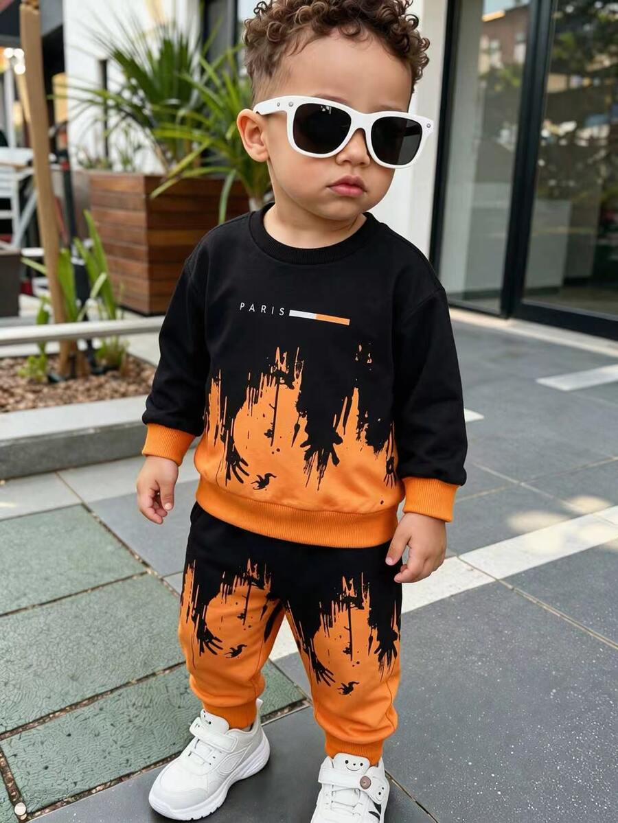 SHEIN 2件組幼兒休閒牛仔賽車競速萬聖節塗鴉圖案圓領上衣運動長褲套裝,拼色設計,秋季橘色 - 黑色 - 查看 1