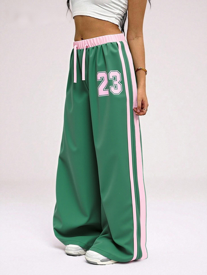 SHEIN Gepersonaliseerde sport-casual broek met kleurblokkenprint voor meisjes in de puberteit. Levendige kleurenclash, uniek numeriek printaccent, losse pasvorm voor een actieve levensstijl en straatkleding, zomer