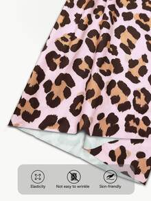BamGleam Setelan Olahraga Wanita: Atasan Tank Pendek Motif Leopard dengan Blok Warna dan Rok Celana Pendek dengan Hem Asimetris - MultiWarna - View 3