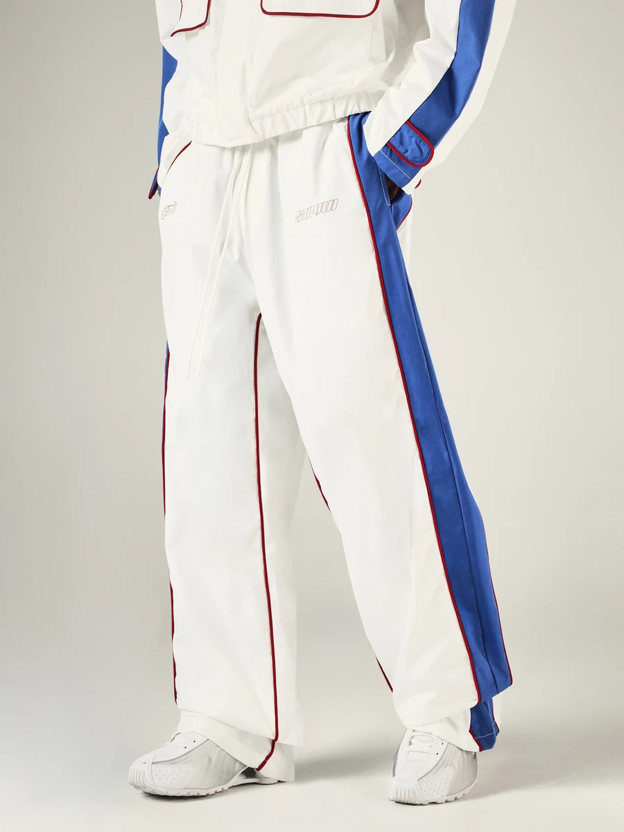 SUMWON Wide Leg Track Pants With Blue Side Panels Red Contrast Piping Drawstring Waist And Patch Back Pockets Streetwear Style - Blue and White - View 1