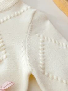 SHEIN 3個月至3歲女嬰米白色鑽石泡泡紋理針織圓領毛衣，淺粉色3D緞面蝴蝶結長袖上衣，純色柔和溫馨春秋針織套頭外套，適合生日拍照 - 米色 - 查看 6