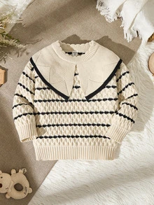 SHEIN Vintaside Kids 少女套头衫，秋冬时尚新品。奶油色、杏色和黑色条纹针织面料，柔软甜美。宽领口设计展现活泼气息，充满感觉。袖口精致华丽。适合秋冬穿着。面料质感强，柔软亲肤，轻盈舒适，温暖舒适，给小女孩带来更多舒适感。适合各种场合，展现好学女孩的优质风范，适合居家休闲、校园聚会、节日和派对。 - 米色 - 查看 5