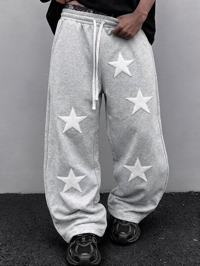 Street Life Pantalones de chándal de tela de toalla bordados de corte holgado para hombre
