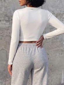 Eryvara تي شيرت نسائي جديد بتصميم بسيط مع حافة مكشكشة وأكمام طويلة وقصة ضيقة، ملابس كاجوال - أبيض - مشاهدة 2