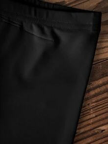 LOONEY TUNES X SHEIN طقم كاجوال للبنات الصغيرات ببلوزة رياضية بياقة دائرية مطبوعة برسومات كرتونية وبنطال ليقنز - أبيض - مشاهدة 6