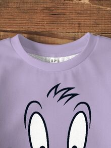 LOONEY TUNES X SHEIN طقم كاجوال للبنات الصغيرات ببلوزة رياضية بياقة دائرية مطبوعة برسومات كرتونية وبنطال ليقنز - أبيض - مشاهدة 3