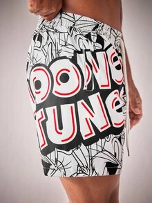 LOONEY TUNES X SHEIN Pantalones cortos de playa con cordón en la cintura y bolsillo, diseño de dibujos animados con colores contrastantes para hombre - Blanco y Negro - Ver 5