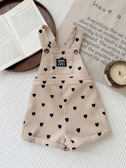 SHEIN Pelele con tirantes y un bolsillo con patrón de corazón tejido para niña bebé