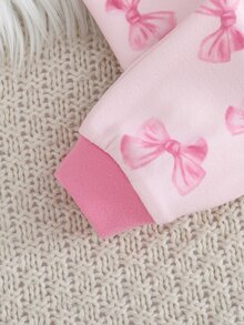 Cozy Pixies طقم بيجامة ضيق للبنات الرضع بتصميم فيونكة، ملابس علوية علوية بأكمام طويلة وياقة دائرية، وبنطال طويل بخصر مطاطي - وردي فاتح - مشاهدة 4