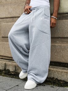 Major Grit Celana Jogging Pria Manfinity Streetrush Model Lebar dengan Bordir Huruf dan Desain Patchwork Kreatif, Warna Hitam - Light Grey - View 1