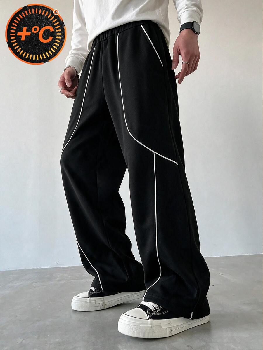 SHEIN 返校季 13-16 歲青少年男孩休閒街頭風黑色拼接線條寬鬆寬腿運動長褲,保暖冷色調拼色飾邊抓絨內裡慢跑褲,適合春秋日常上學、街頭穿搭與戶外運動 - 黑色 - 查看 1
