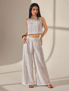 SHEIN PETITE 女款條紋圓領無袖上衣與長褲兩件套，度假、夏季亞麻風休閒條紋荷葉邊飾對比色無袖兩件套，荷葉邊下擺上衣 + 寬腿長褲，夏季度假、咖啡廳、休閒穿搭熱門款，復古風造型。女款鄉村風穿搭、女款工作穿搭、女款海邊度假穿搭、女款休閒套裝、女款夏季穿搭 - 杏色 - 查看 7