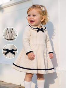 SHEIN Playful Pals 1件幼童女款A字羅紋洋裝，甜美優雅可愛，卡其色與黑色蝴蝶結娃娃領飾邊，長袖彼得潘領，常規款派對秋季公主舒適風 - 米色 - 查看 1