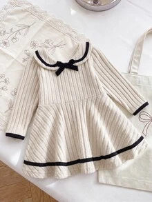 SHEIN Playful Pals 1件幼童女款A字羅紋洋裝，甜美優雅可愛，卡其色與黑色蝴蝶結娃娃領飾邊，長袖彼得潘領，常規款派對秋季公主舒適風 - 米色 - 查看 6