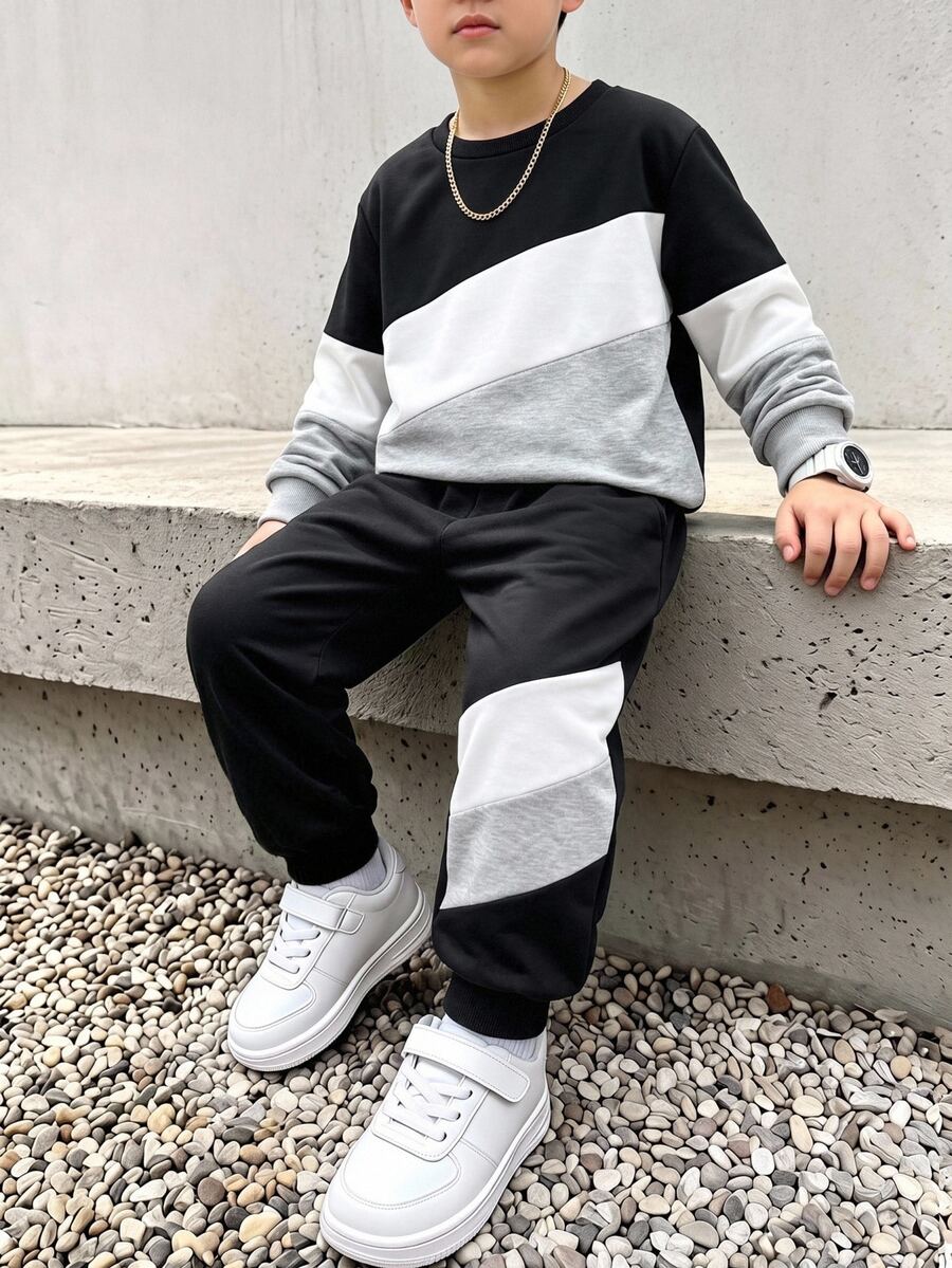 SHEIN Coolqubz 2件組青少年男孩時尚拼色運動衫與長褲套裝,時尚拼色設計,帥氣街頭風,柔軟舒適面料,易穿著,適合春秋季節,適用於各種場合,適合上學、外出,男孩必備2件套,學院風,秋冬 - 黑與白 - 查看 1