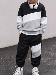 SHEIN Coolqubz 2件組青少年男孩時尚拼色運動衫與長褲套裝，時尚拼色設計，帥氣街頭風，柔軟舒適面料，易穿著，適合春秋季節，適用於各種場合，適合上學、外出，男孩必備2件套，學院風，秋冬 - 黑與白 - 查看 4