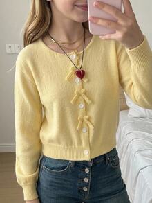 SHEIN Tween Girls Cardigans Apricot Jacquard Round Neck Cardigan With Fur Bow + Handmade Knit Bow + Hidden Buttons Long Sleeve Short Knit Sweater Soft And Comfortable Suitable For Spring Autumn Winter Outings Travel Vacation Daycare Play - Yellow - View 10