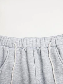 SHEIN 青少年女孩秋冬休閒街頭風針織抽繩拼接設計口袋小標誌印花長褲，適合返校與街頭休閒外出，寬鬆版型、鬆緊腰設計，舒適灰色「Curved」長褲 - 灰色 - 查看 11