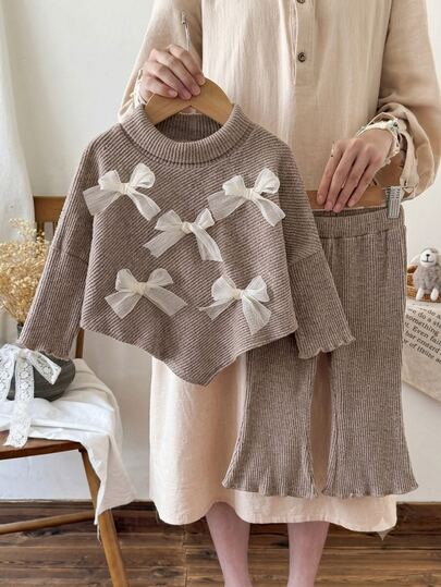 SHEIN Vintaside Kids 2pcs/Set Girls Korean Style Soft 3D Mesh Bow Ribbed High Neck Long Sleeve Asymmetrical Top & Ruffle Flared Pants Set, Suitable For Outings, Gatherings, Casual Wear, Spring And Autumn