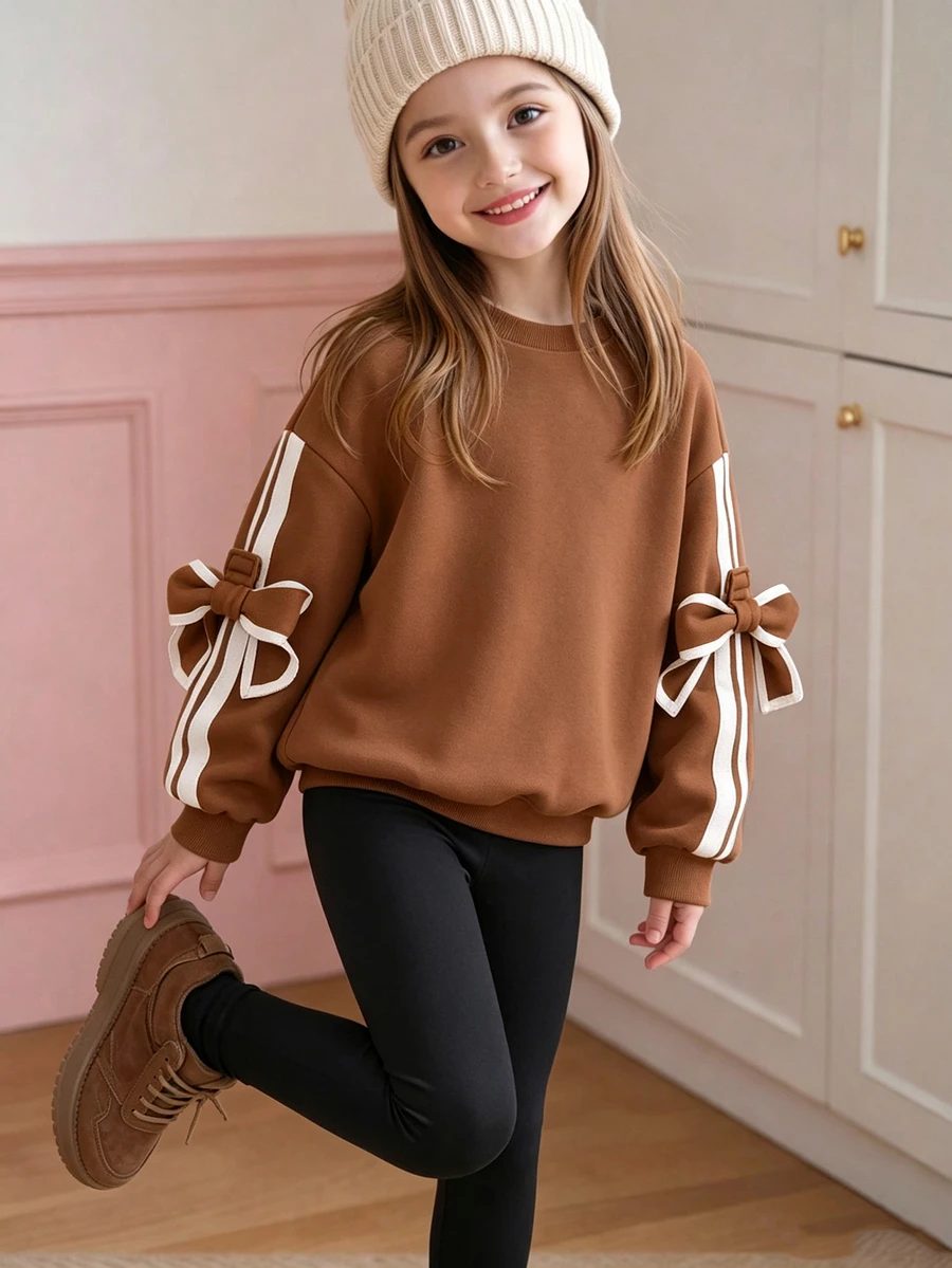 SHEIN Elladie kids 青少年女孩秋季服飾 蝴蝶結條紋袖圓領衛衣 休閒純色落肩套頭上衣