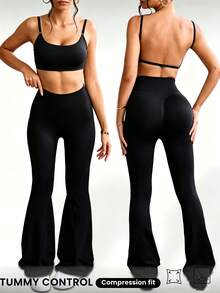 SHEIN Set Olahraga Wanita Tanpa Jahitan, Terbuat dari Kamisol Ultra Pendek Tanpa Punggung dan Celana Flare Warna Polos - Hitam - View 1