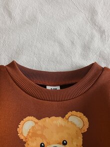 SHEIN 2件組女嬰棕熊印花3D蝴蝶結裝飾圓領長袖套頭衛衣，抓絨內裡加厚上衣 + 鬆緊腰羅紋針織修身顯瘦內搭褲，休閒復古可愛簡約運動韓風套裝，適合秋冬日常穿著、上學、購物及各種場合 - 棕色 - 查看 6