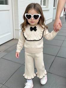 SHEIN Vintaside Kids 女嬰針織套裝 2 件組，法式荷葉邊套頭上衣配手工蝴蝶結，可愛優雅甜美針織長褲，舒適柔軟，適合日常穿著、外出、旅行、上學、秋冬、派對、休閒、假日 - 米色 - 查看 11