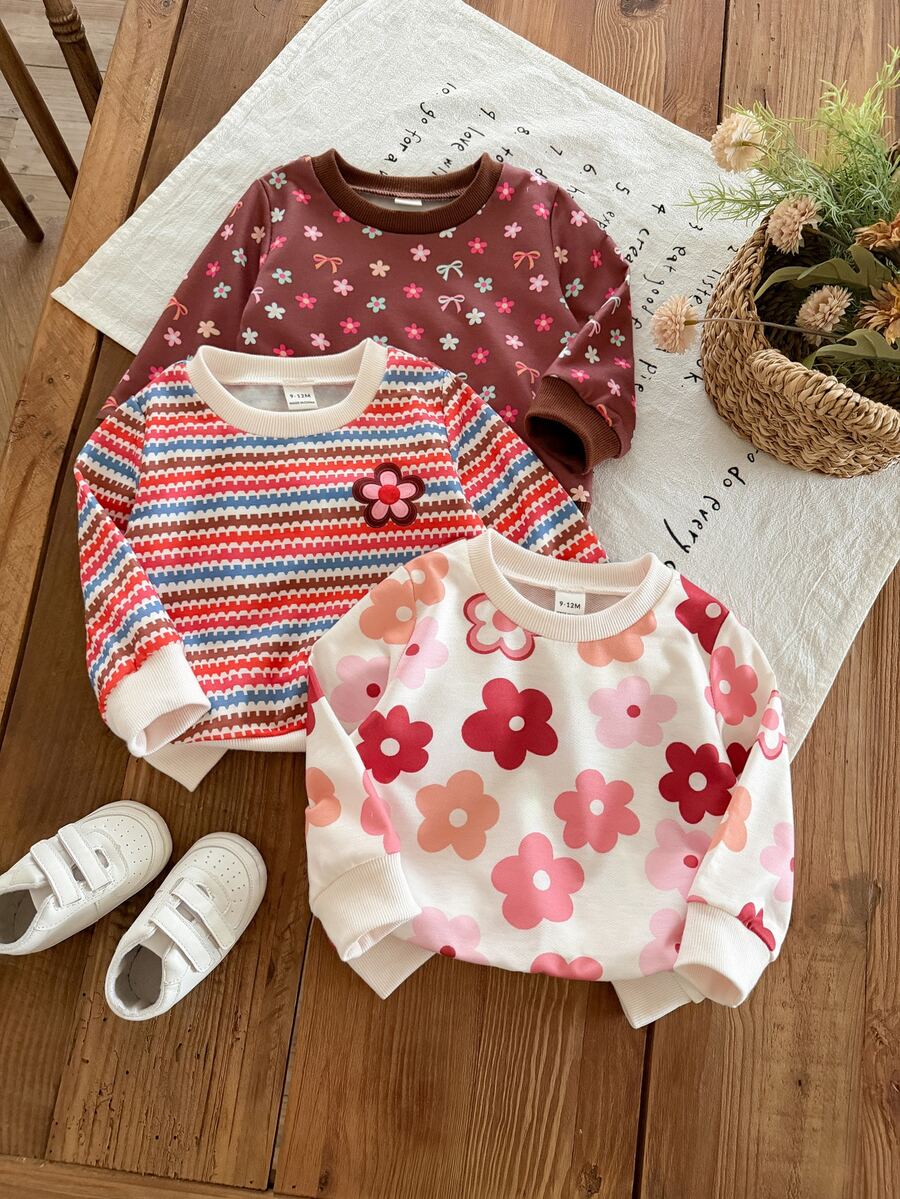 SHEIN Vintaside Kids 3件組女嬰秋冬抓絨圓領運動衫,咖啡色、粉色、白色復古甜美風,紅花波浪彩色條紋滿版印花,適中厚度,適合日常穿著、幼兒園、外出與派對 - 彩色 - 查看 1