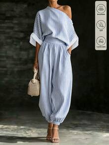 SHEIN Fiorisel 女款春夏慵懶紋理不對稱肩休閒兩件套，不對稱肩設計搭配寬鬆落肩短袖上衣與高腰鬆緊收口燈籠褲，同色系紋理面料打造隨性氛圍，適合日常通勤、休閒外出、居家穿著等多場合，女款不對稱肩休閒兩件套，紋理寬鬆版型套裝，不對稱設計上衣＋收口褲，慵懶夏季套裝 - 藍色 - 查看 4